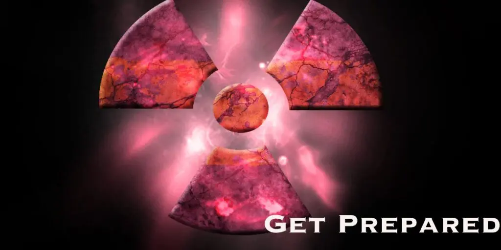 A pink and marbled radioactive symbol glows against a dark background, with “Get Prepared” in white text at the lower right—an urgent reminder about nuclear preparedness.