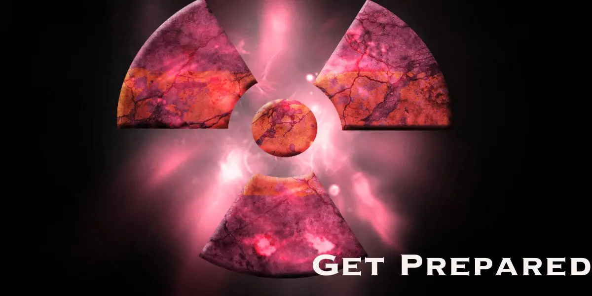 A pink and marbled radioactive symbol glows against a dark background, with “Get Prepared” in white text at the lower right—an urgent reminder about nuclear preparedness.