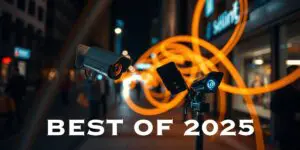 Two must-have security gadgets—a pair of cameras and a spotlight—face a city street at night with orange light trails in the background; text reads "BEST OF 2025. Secure 2025 in style.