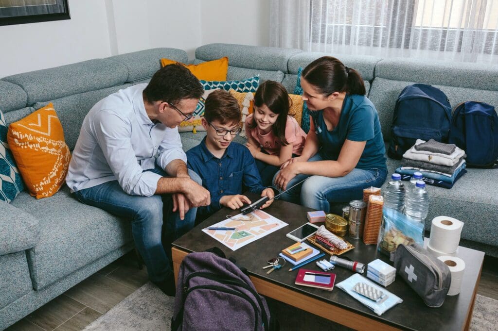 Parents explaining to their children how to use the radio in an emergency