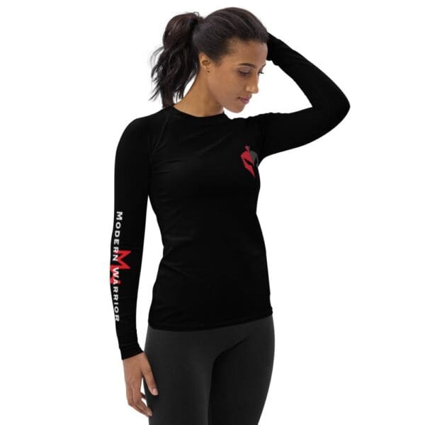 A "MW Combatives Women's Rash Guard" worn by a woman.