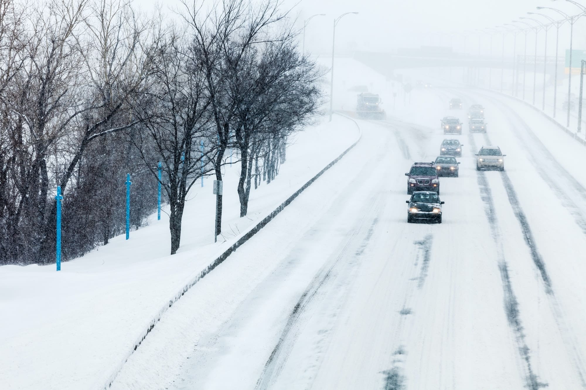 Traffic and Snowstorm on the Highway