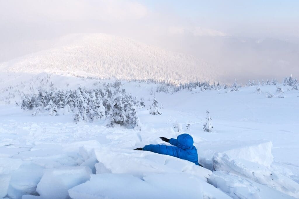 A man covered with a snow avalanche