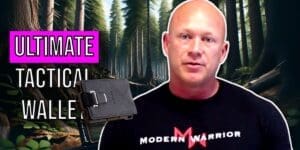 A man in a "Modern Warrior" shirt stands beside text promoting the Dango M1 Maverick, a "Spec Ops Edition" tactical wallet. All this unfolds against a rugged forest backdrop.