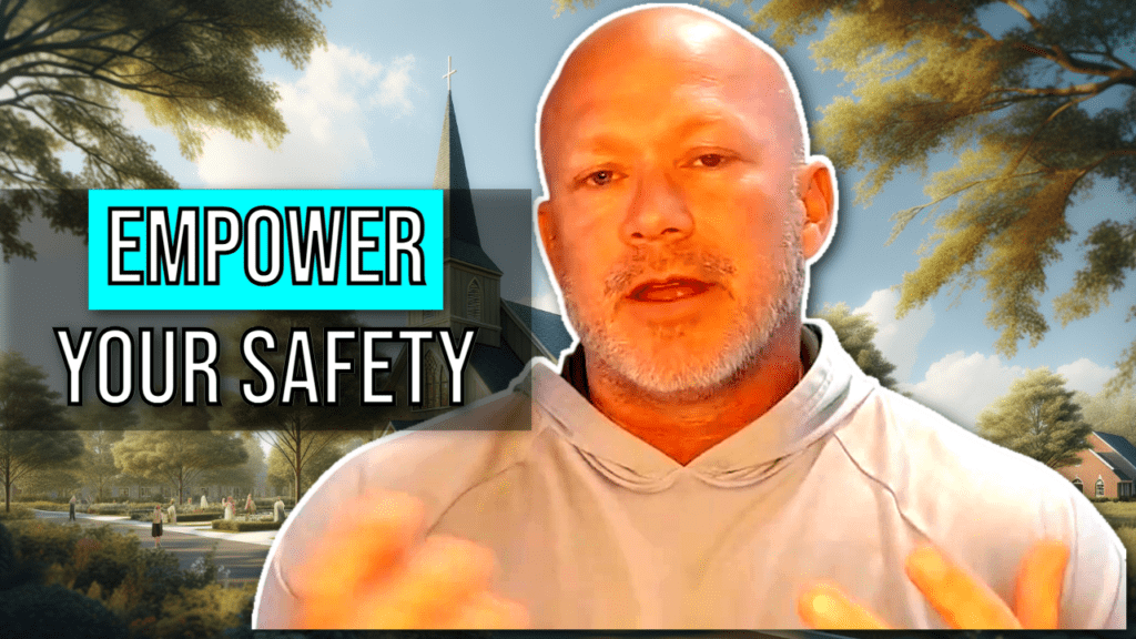 A man in a light gray hoodie speaks in front of a rural church scene. Text reads "Empower Your Safety by Recognizing Threats.